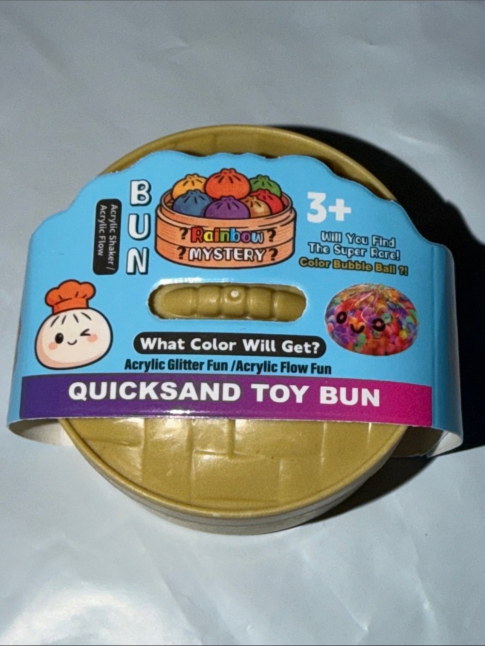 Quicksand Toy Bun - Gold Rainbow Mystery Slime Keychain